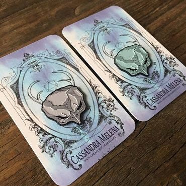 Bird Skull Mask Enamel Pin